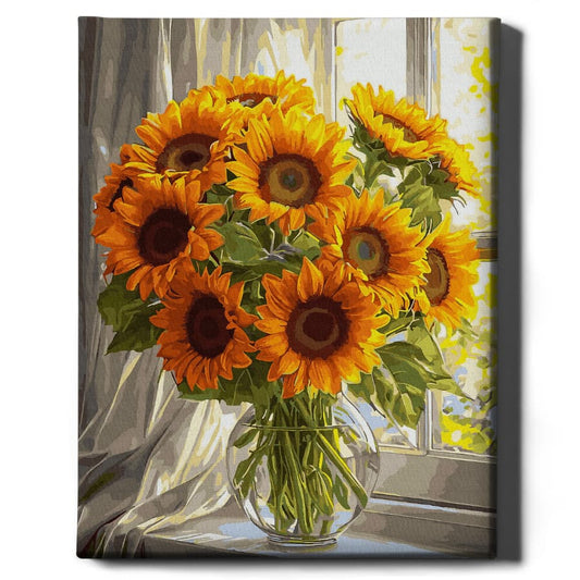 Słoneczniki przy oknie